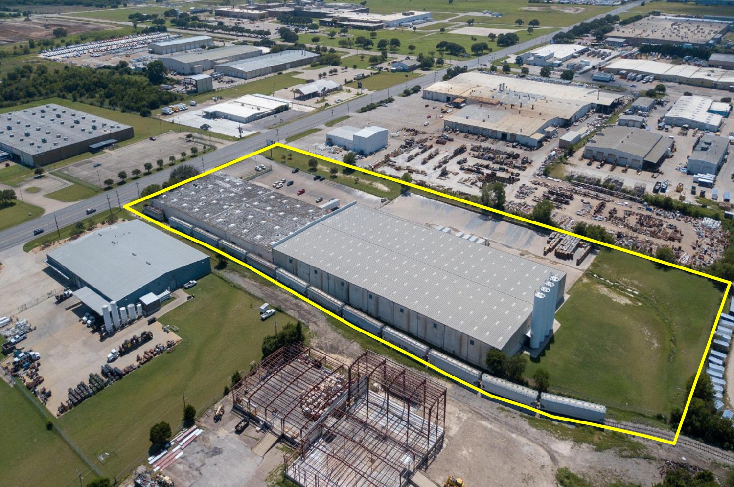 aerial view of industrial building with boundary line